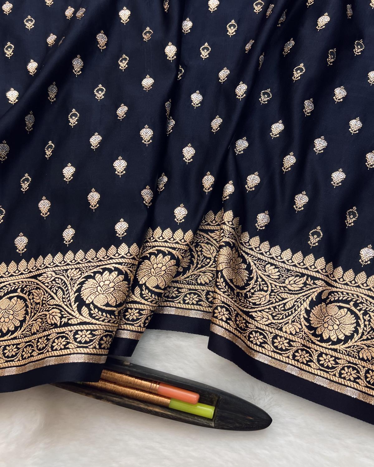 Soft and lightweght texture of navy blue silk saree with gold ad silver zari buti design-Niyarah