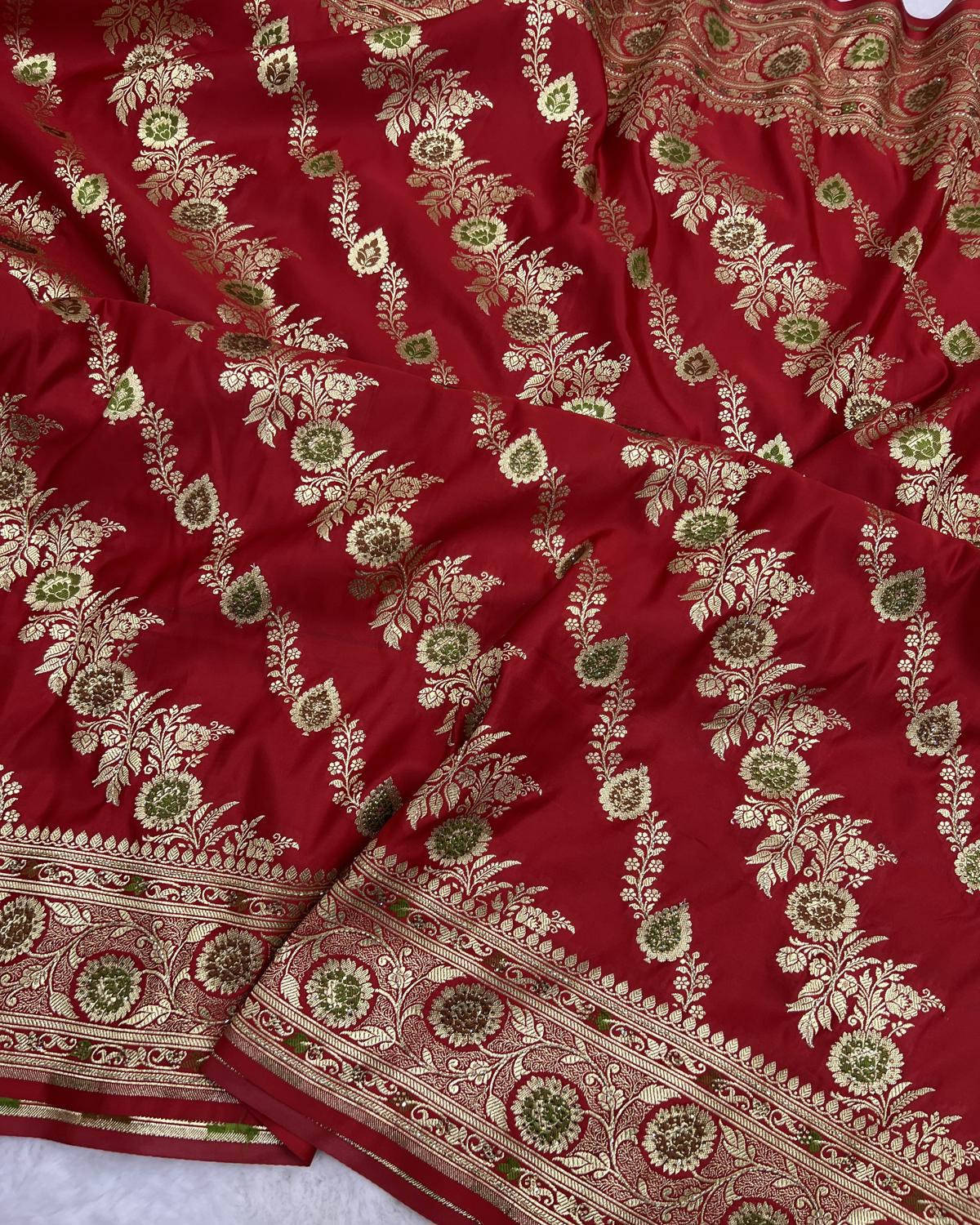 red swarowski work bridal saree with meena aara pattern