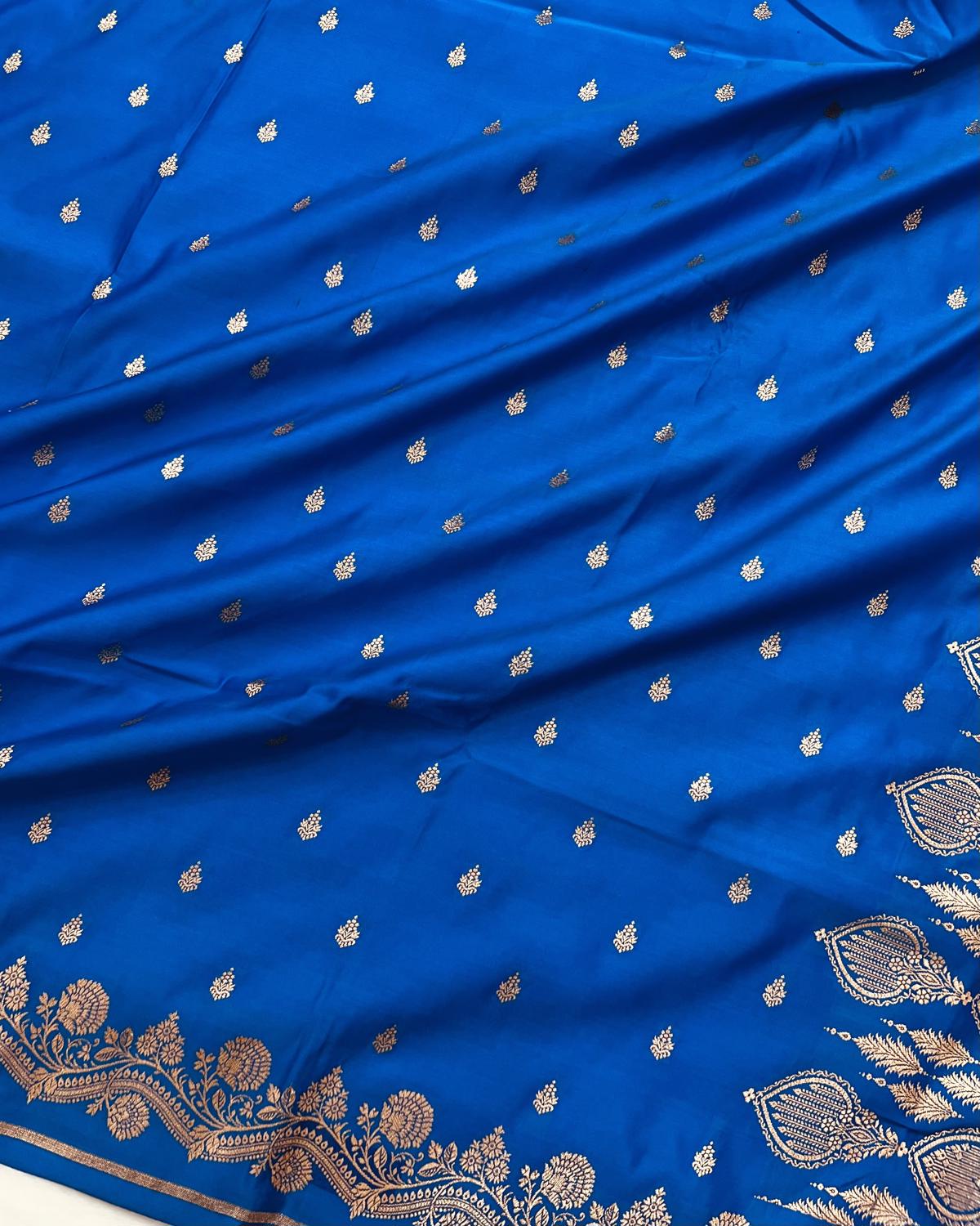 Elegant blue Banarasi Silk saree with floral buti design on all over body for weddings-Niyarah