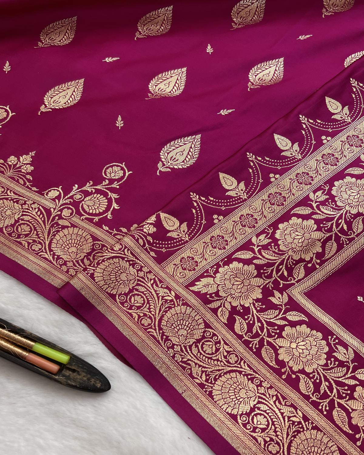Rani pink Banarasi silk saree with floral border for festive celebrations-Niyarah