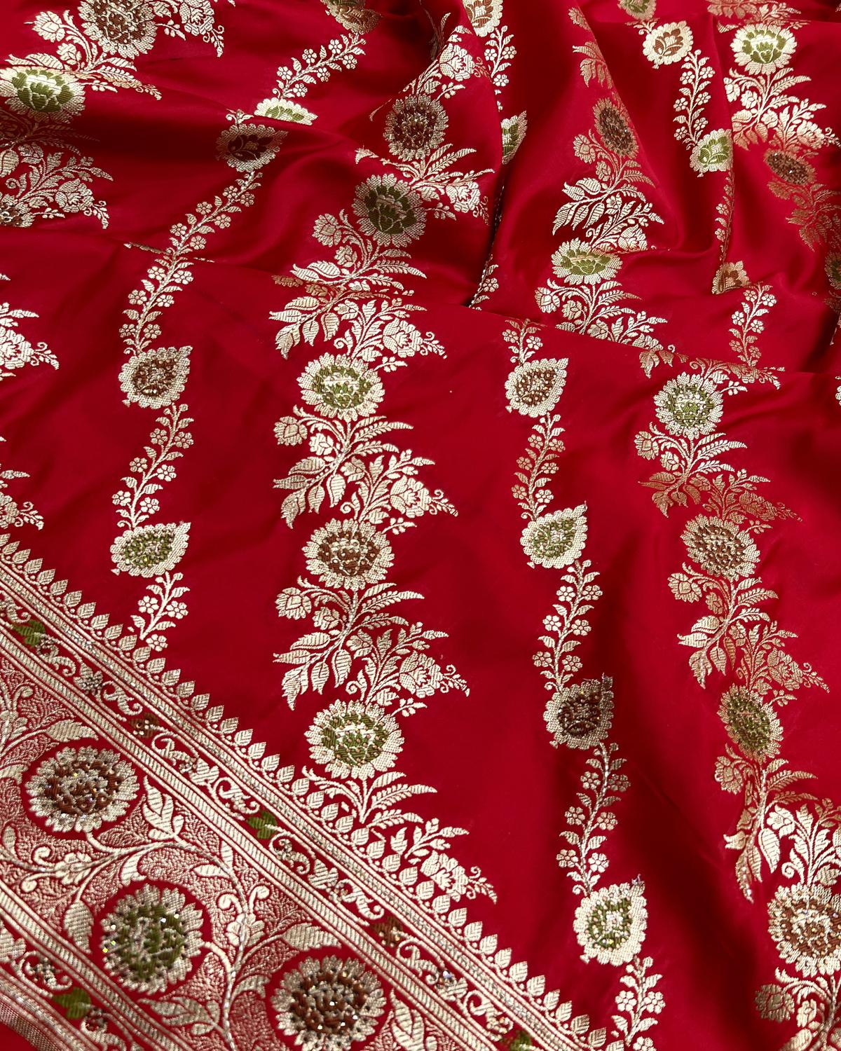 Swarowski dana work red saree with floral pattern